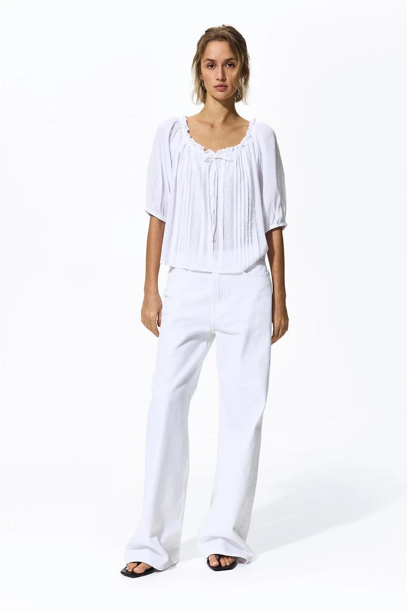 Blouse à plis nervurés