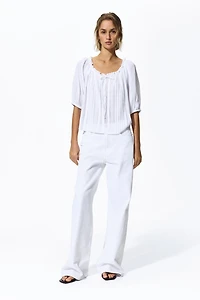 Blouse à plis nervurés