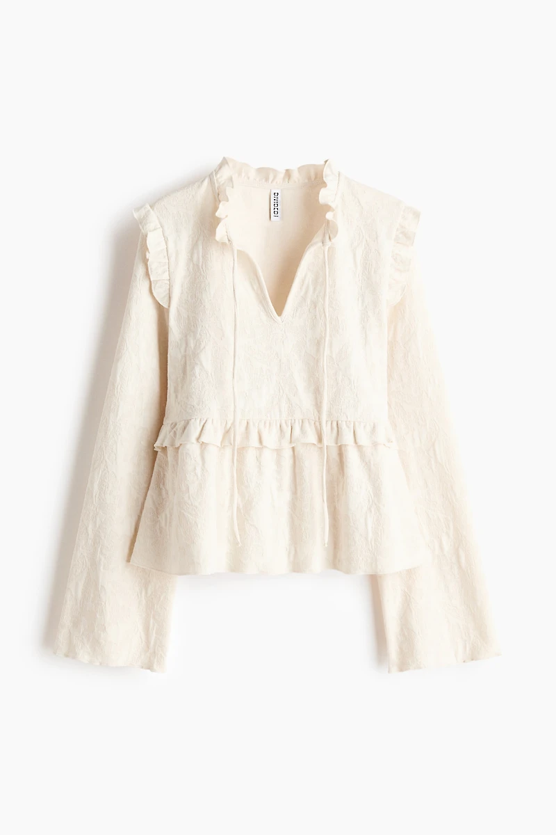 Blouse en jersey jacquard