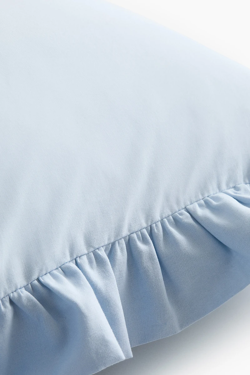 Housse de coussin volantée en coton