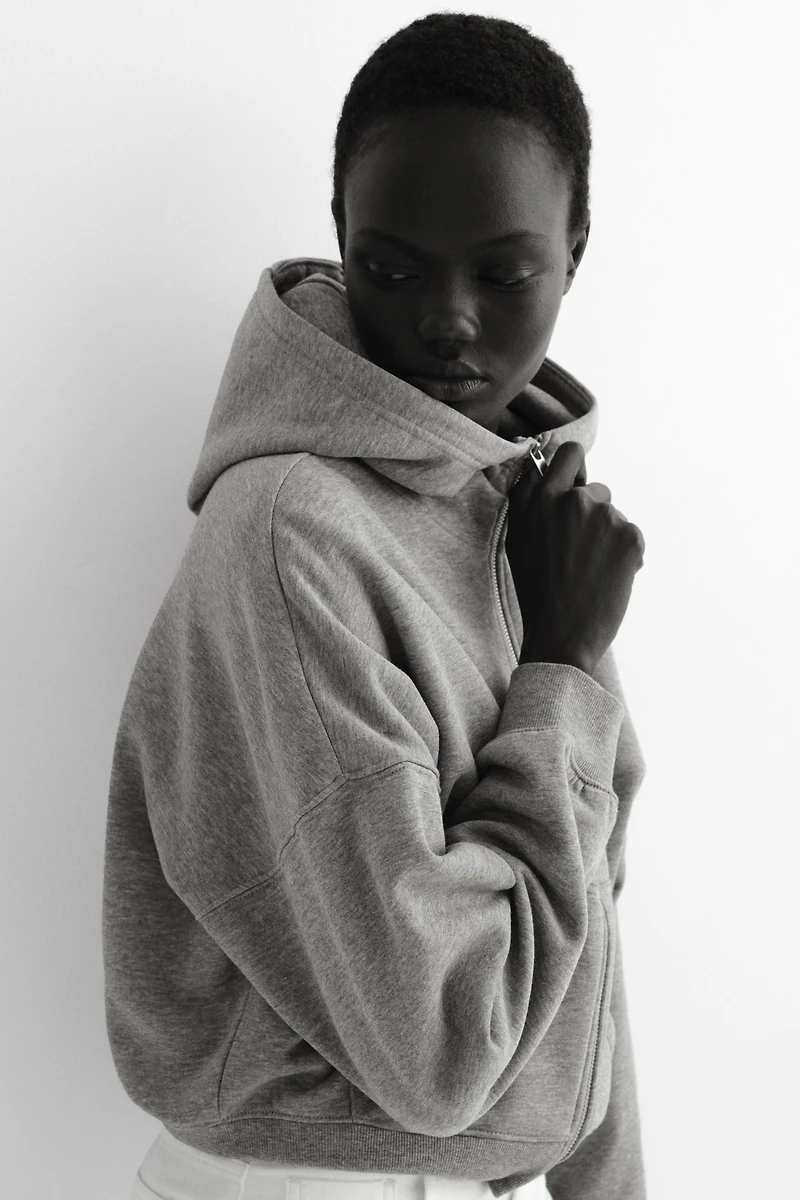 Veste à capuche zippée