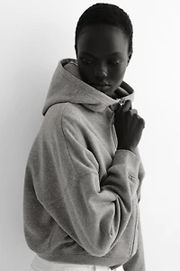 Veste à capuche zippée