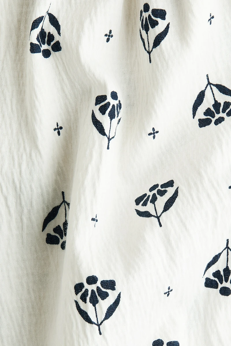 Robe à manches volants en coton