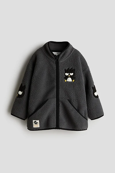 Veste en polar avec appliqués