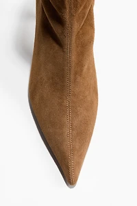 Bottines chaussettes en cuir