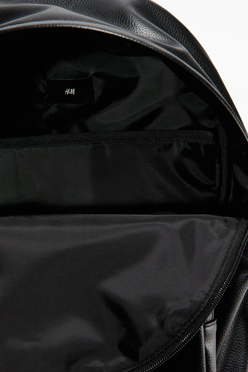 Sac à dos en tissu enduit