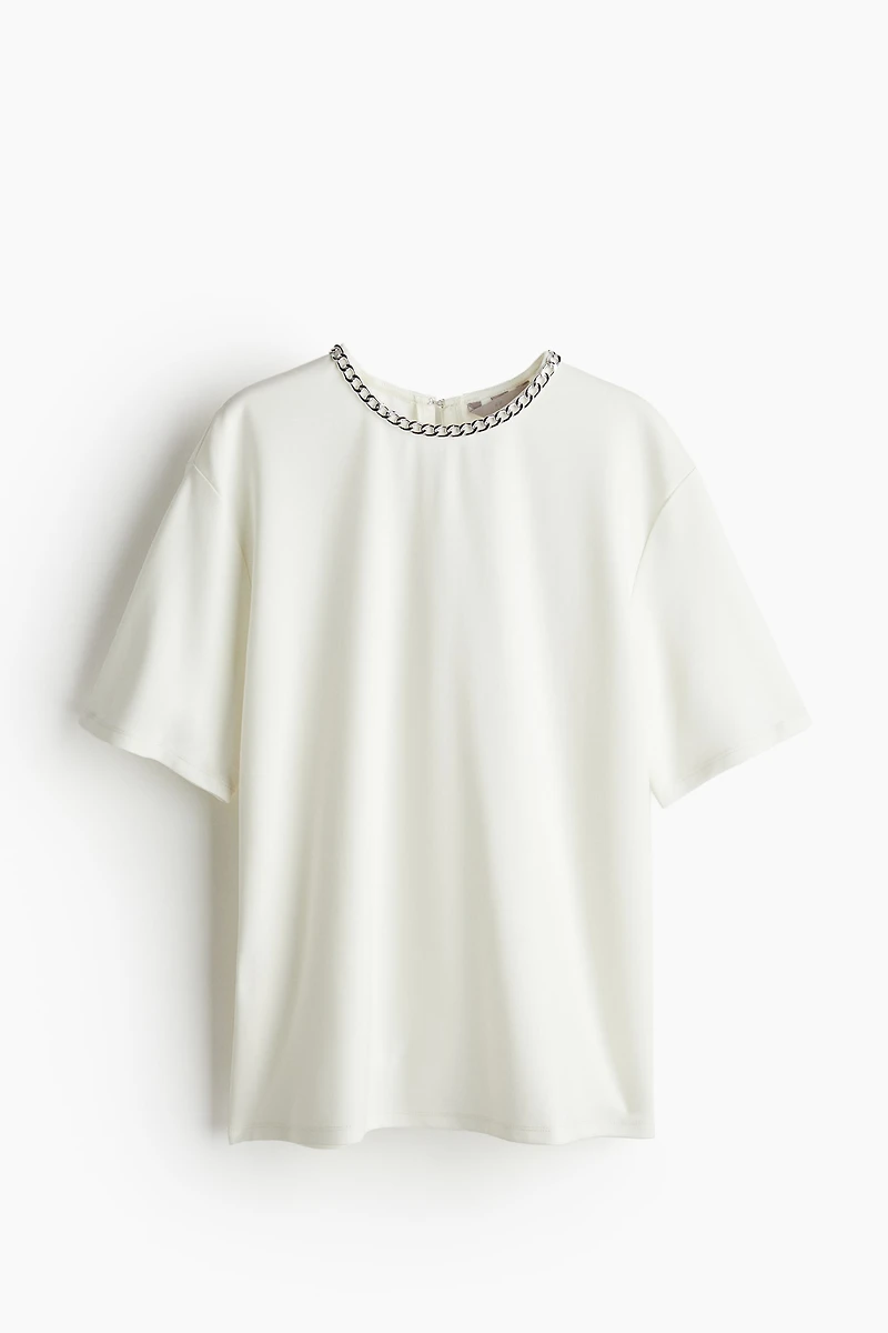 Chain-Decorated Top