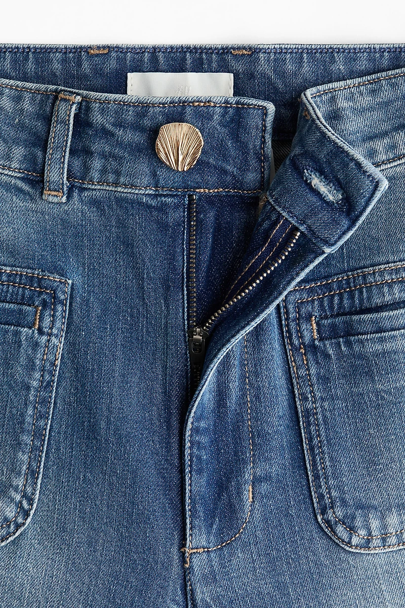 Jean taille haute avec jambes larges