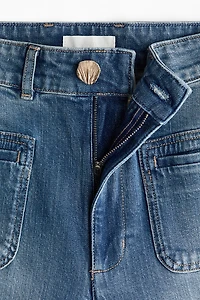 Jean taille haute avec jambes larges