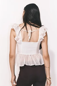Blouse péplum avec détail à nouer