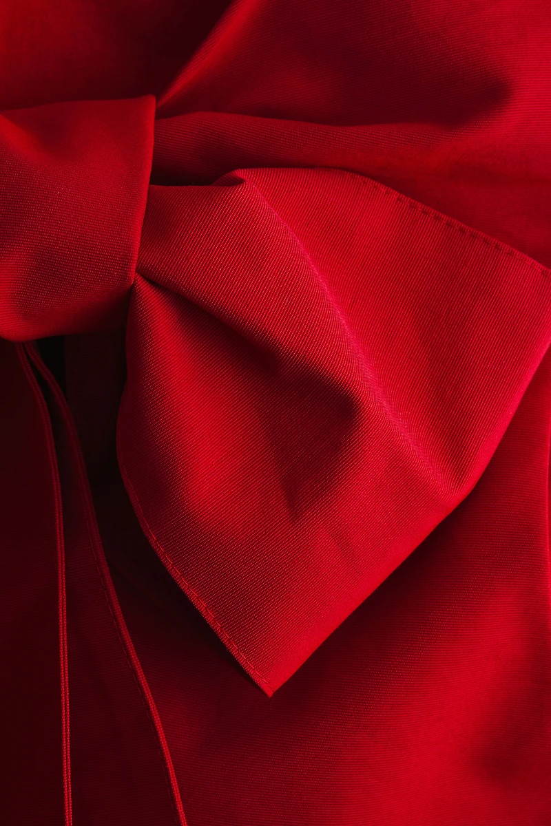 Haut péplum avec détail à nouer