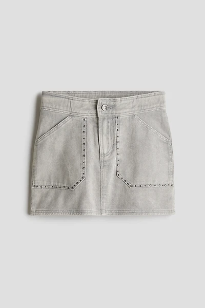 Jupe cloutée en denim