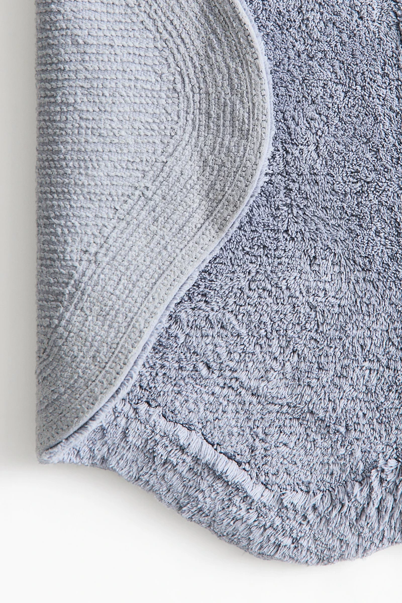 Tapis de bain en coton touffeté