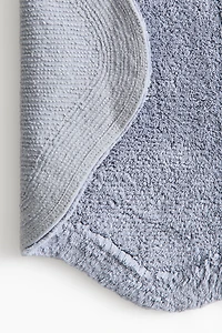 Tapis de bain en coton touffeté