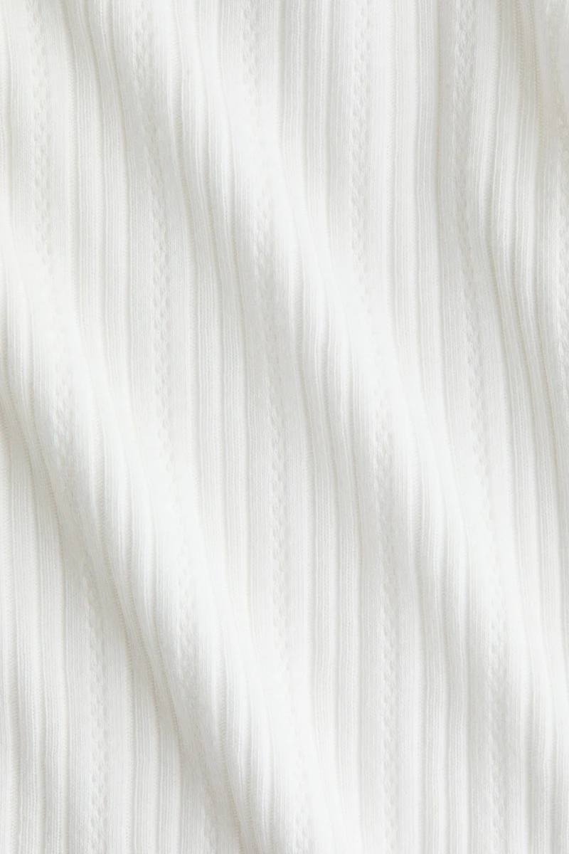 Haut en jersey pointelle