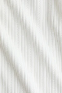 Haut en jersey pointelle