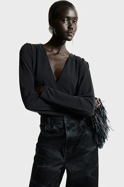 Maillot string drapé à encolure en V