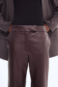 Pantalon à jambes droites en tissu enduit