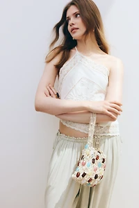 Haut asymétrique avec dentelle