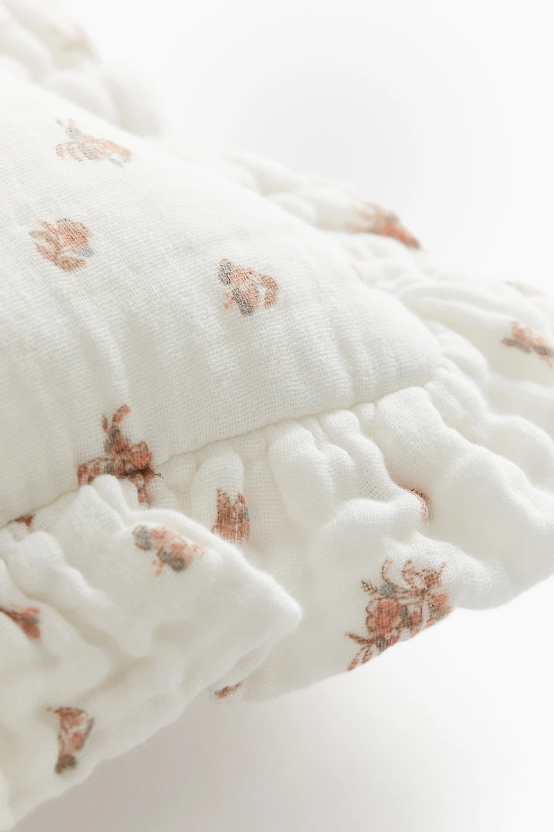 Coussin volanté en coton