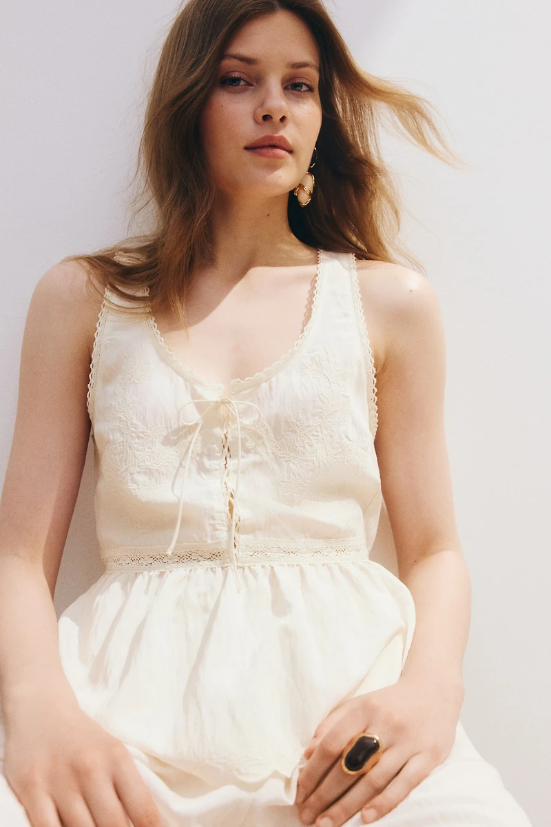 Lace-Up Peplum Top