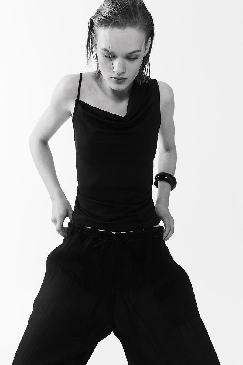 Draped Asymmetric Top