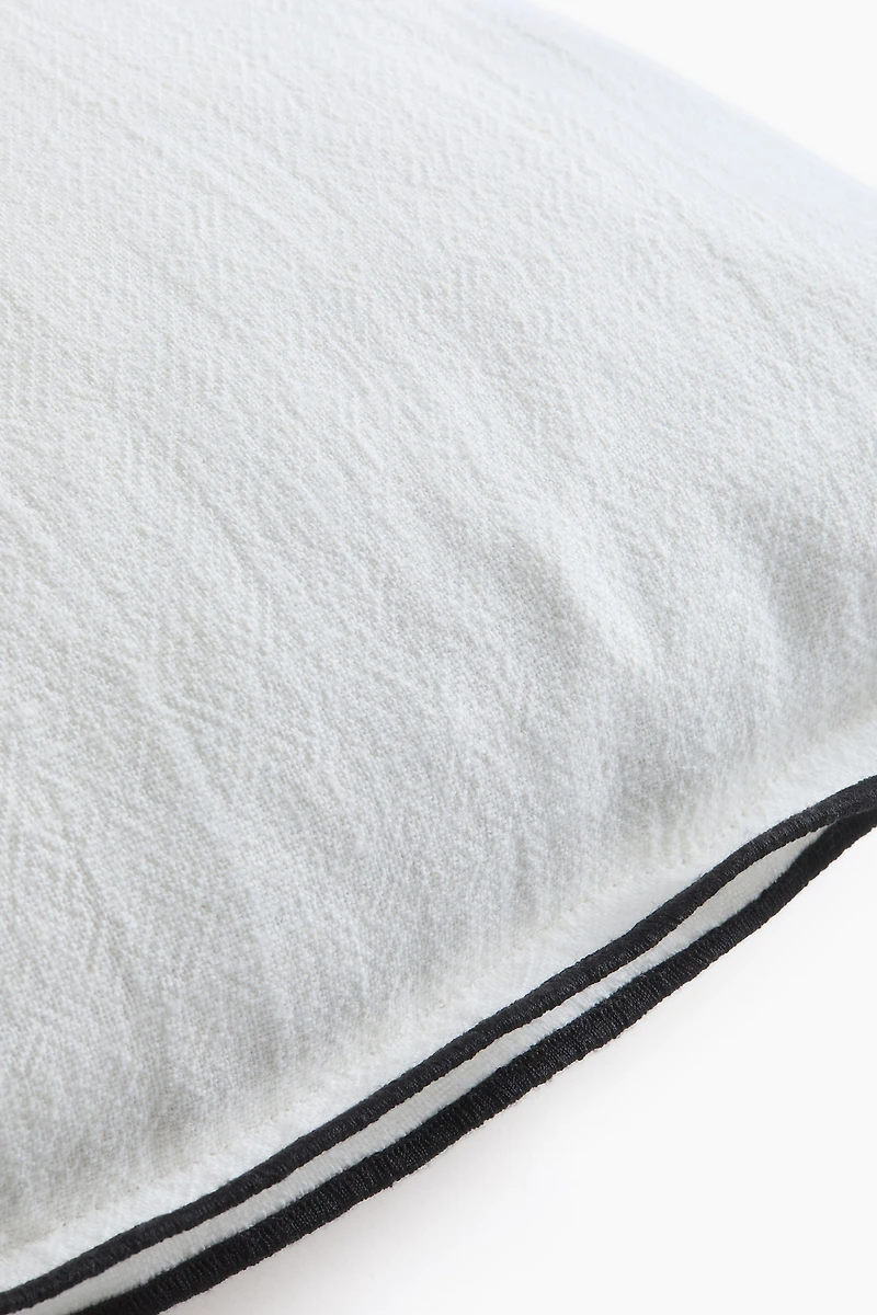 Housse de coussin en lin mélangé