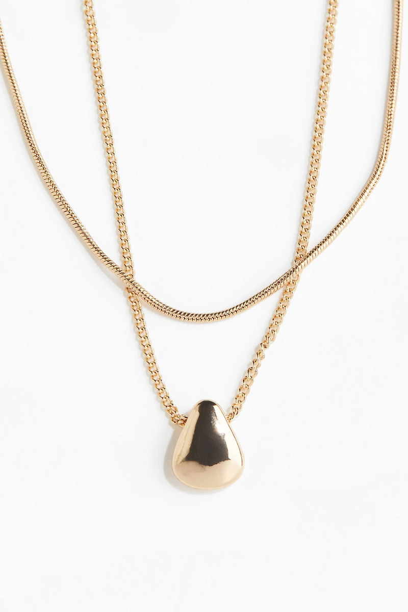 Collier à deux rangs avec pendentif