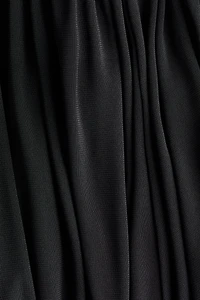 Robe asymétrique à effet drapé