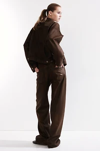 Pantalon en sergé enduit