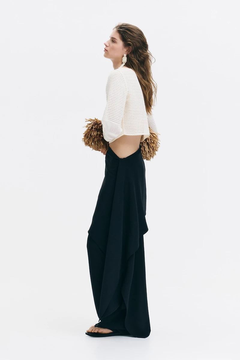 Pantalon chic avec jupe superposée