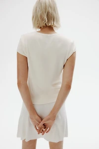 Gilet à manches courtes en fin tricot