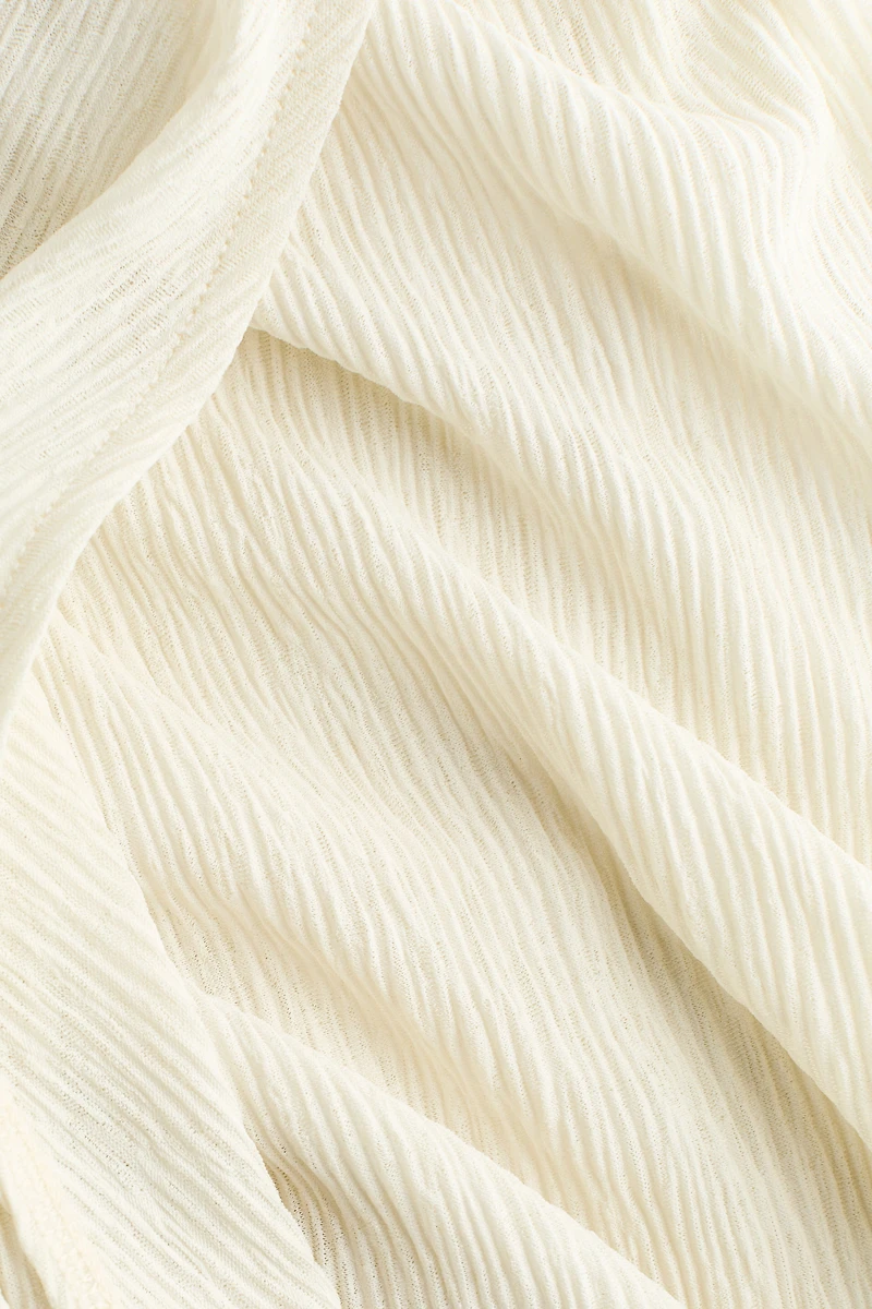 Pantalon froissé à effet croisé