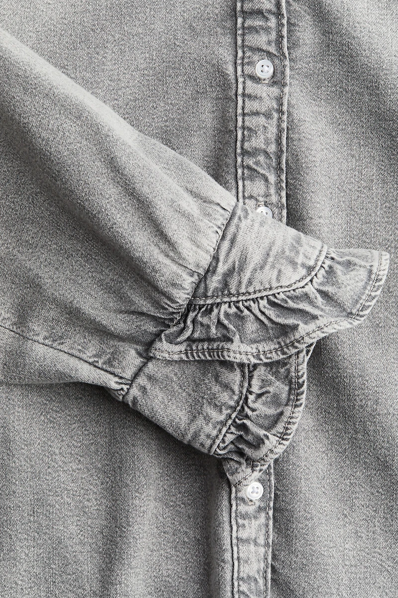 Blouse volantée en denim