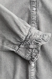 Blouse volantée en denim