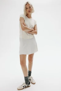 Gilet à manches courtes en fin tricot