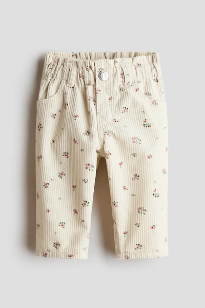 Pantalon à taille froncée en velours côtelé