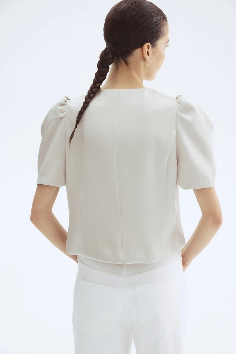 Blouse à manches bouffantes