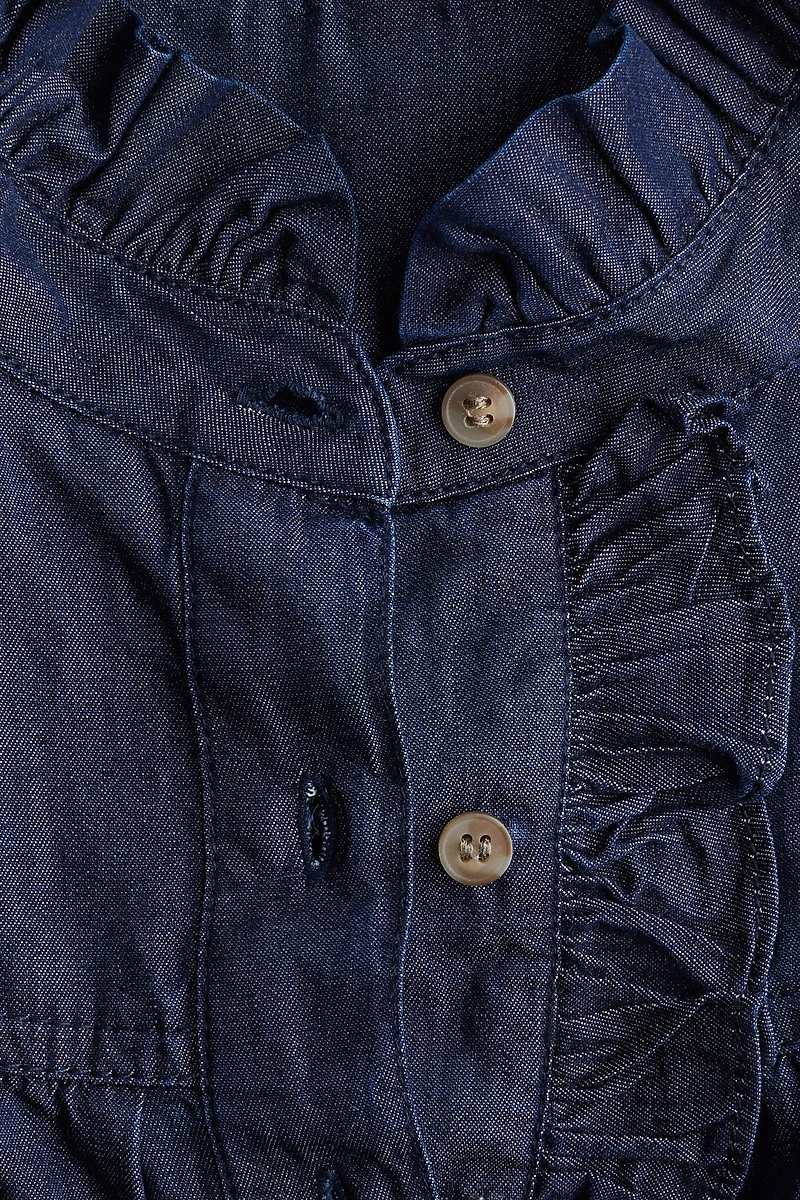 Blouse en denim à col volanté