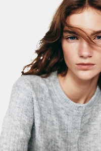 Chandail en tricot torsadé