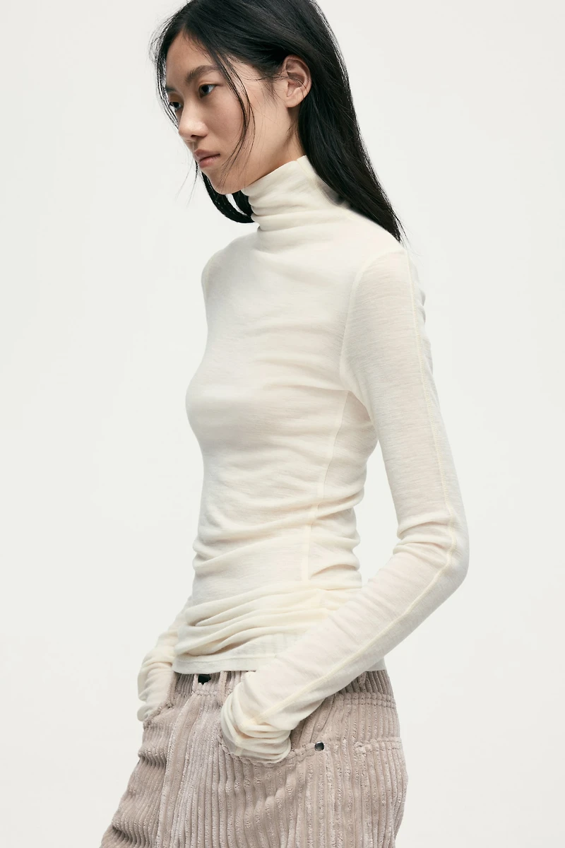 Haut à col roulé en laine