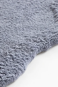 Tapis de bain en coton touffeté