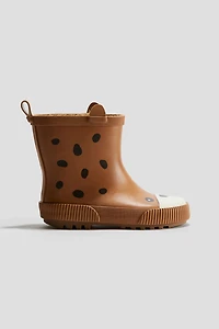 Bottes en caoutchouc doublées de polar