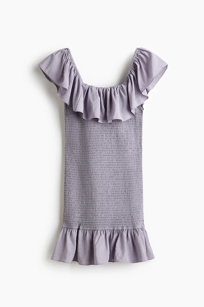 Robe épaules nues à volants