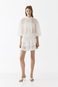 Blouse à volants avec manches ballon