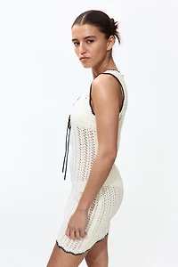 Robe de plage en tricot pointelle