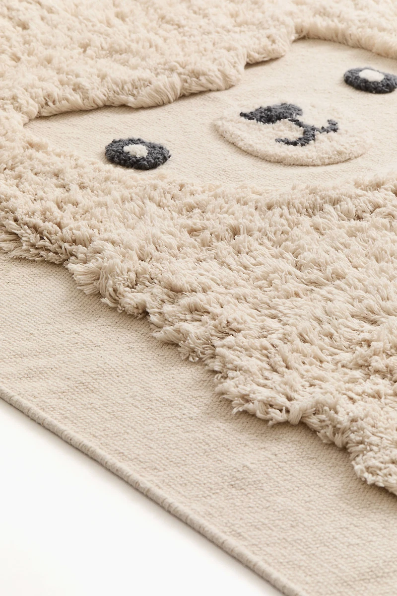 Tapis en coton bouclé