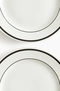 Lot de 2 assiettes moyennes en porcelaine