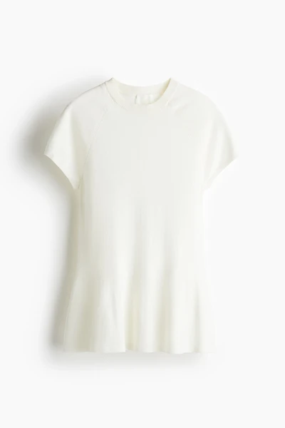 Haut péplum en tricot fin