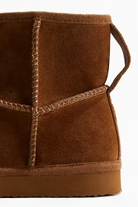 Bottines chaudement doublées en cuir velours